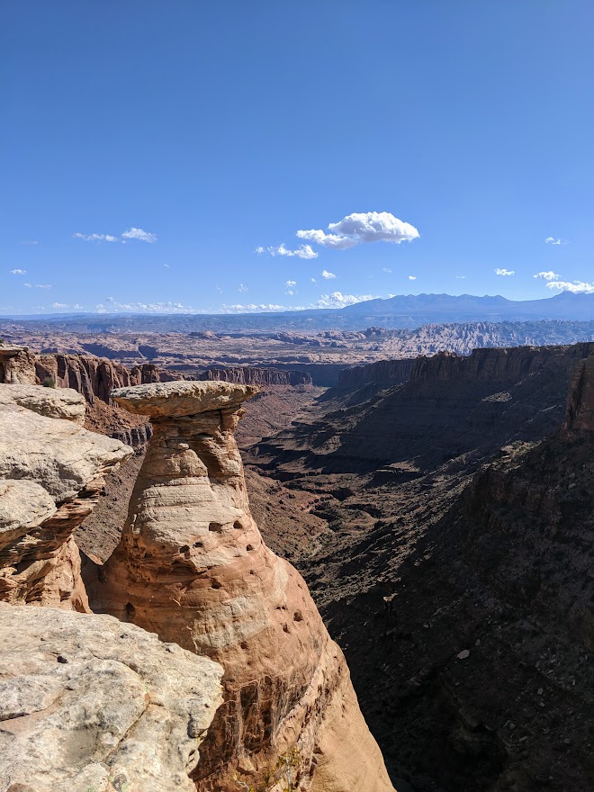 Landscape of cliffs and canyons over a Utah desert